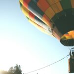 person riding on hot air balloon